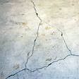 foundation heaving cracks in a slab floor in Oakland