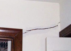 A large drywall crack in an interior wall in Bakersfield