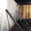 Temporary foundation wall supports stabilizing a Oakland home