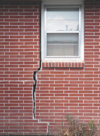 severe foundation wall cracks along a window in Richmond
