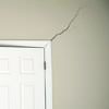 A long drywall crack beginning at the corner of a doorway in a Livermore home.